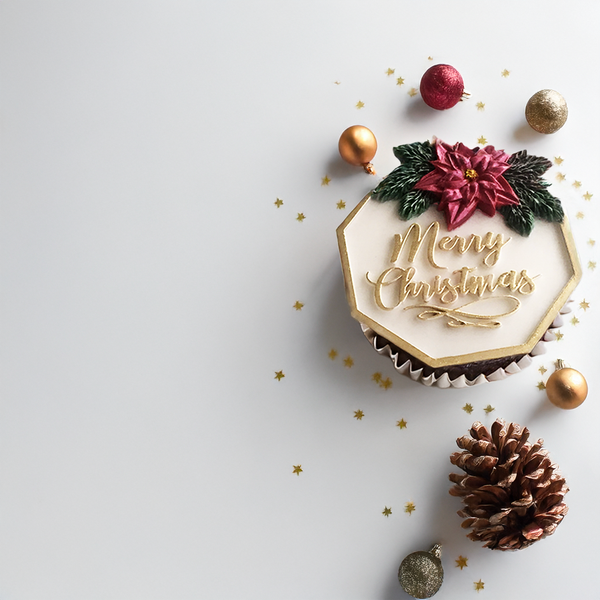 Beautiful Christmas cupcake with Merry Christmas poinsettia  plaque