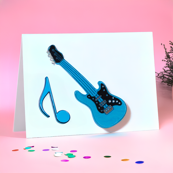 a music themed greetings card with a guitar embellishment