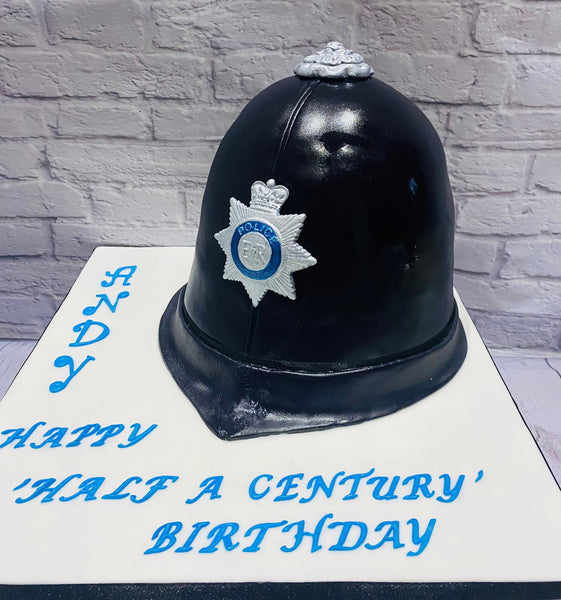 police helmet celebration  birthday cake, with moulded helmet badge 